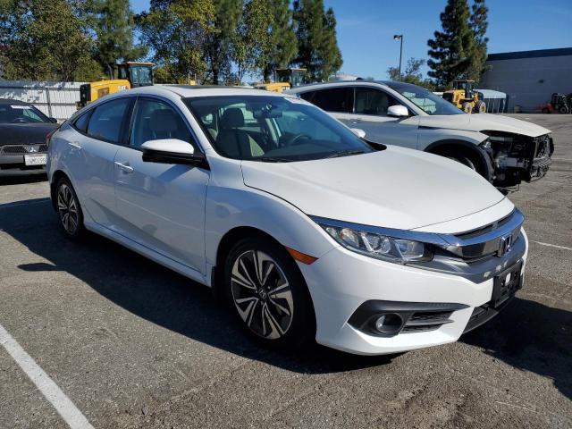 Photo 4 from auction – 2017 HONDA CIVIC EX with VIN 2HGFC1F31HH643166