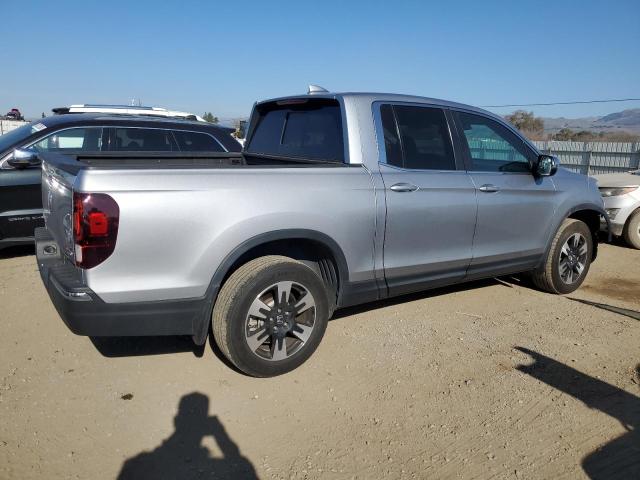 Photo 3 from auction – 2020 HONDA RIDGELINE with VIN 5FPYK3F50LB021879