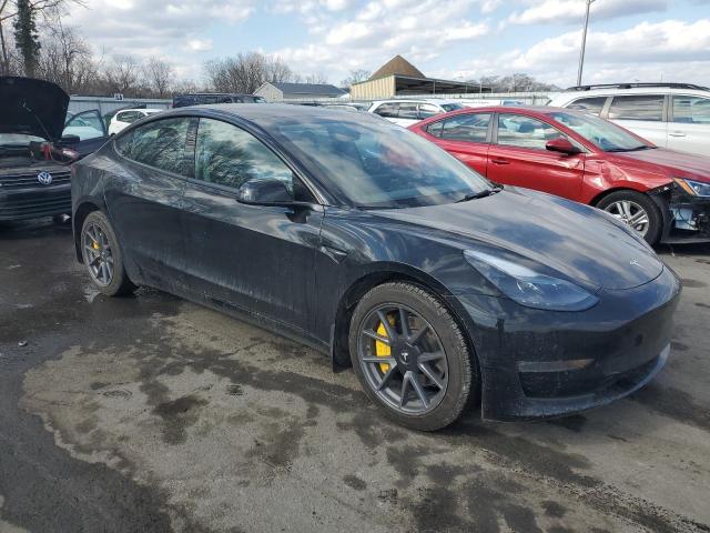 Снимка 4 от търг – 2022 TESLA MODEL 3 с VIN 5YJ3E1EB6NF245697