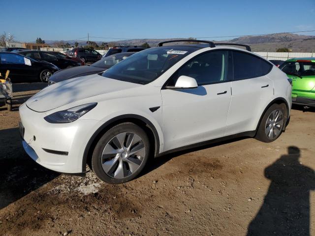 TESLA MODEL Y 2022 с VIN 7SAYGAEE9NF378936 - Снимка от търг