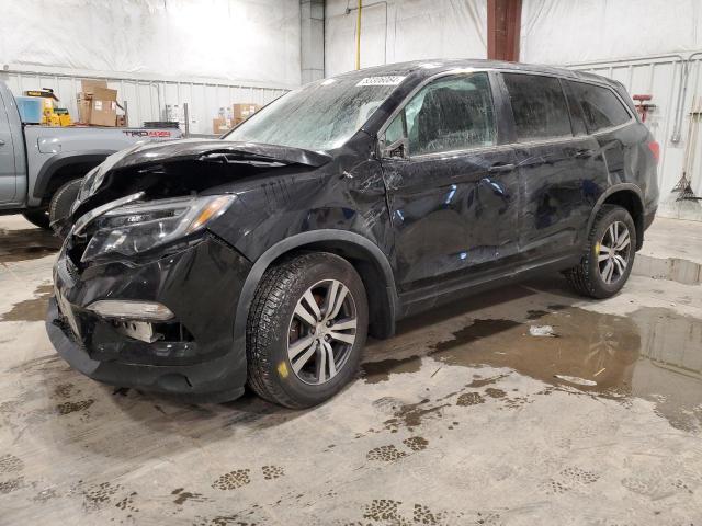 HONDA PILOT EXL 2018 with VIN 5FNYF6H53JB009928 - Photo from auction