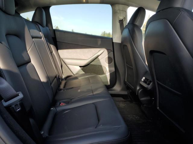 Photo 11 from auction – 2023 TESLA MODEL Y with VIN 7SAYGDEF1PF795061