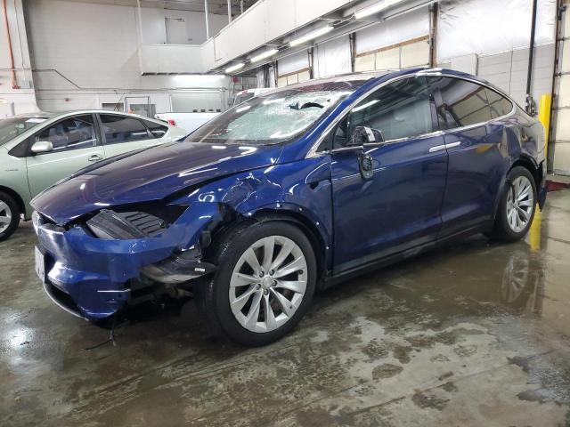 TESLA MODEL X 2017 with VIN 5YJXCBE23HF061237 - Photo from auction