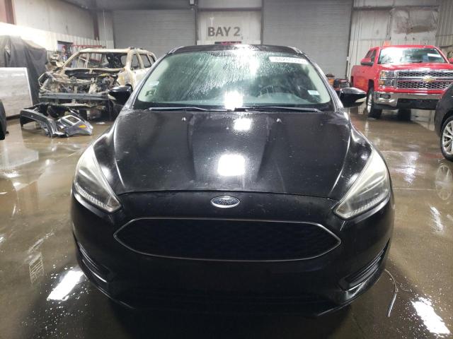 Photo 5 from auction – 2015 FORD FOCUS SE with VIN 1FADP3F2XFL202493