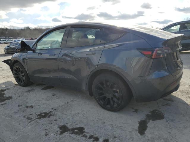 Снимка 2 от търг – 2023 TESLA MODEL Y с VIN 7SAYGAEEXPF857644
