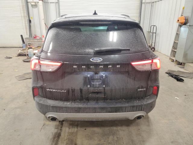 Photo 6 from auction – 2020 FORD ESCAPE TIT with VIN 1FMCU9DZ7LUA70652