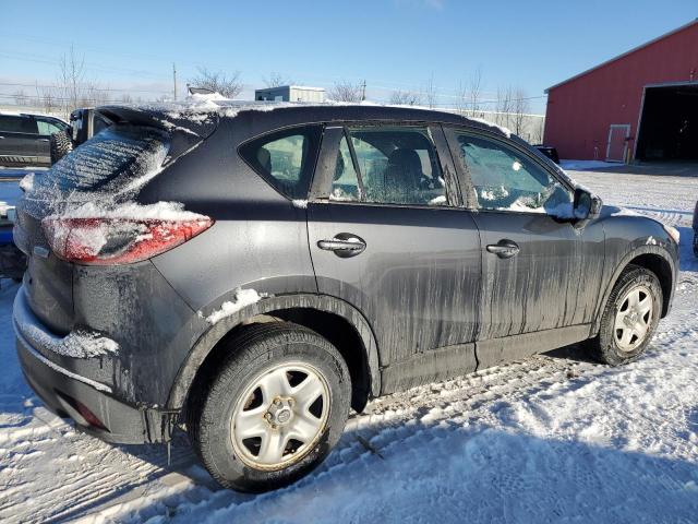 Photo 3 from auction – 2014 MAZDA CX-5 SPORT with VIN JM3KE2BE9E0388357
