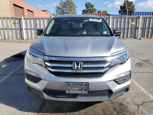 Photo 5 from auction – 2018 HONDA PILOT LX with VIN 5FNYF5H15JB016189