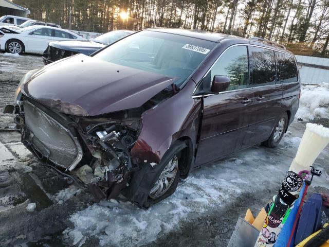 HONDA ODYSSEY EX 2010 with VIN 5FNRL3H44AB106039 - Photo from auction