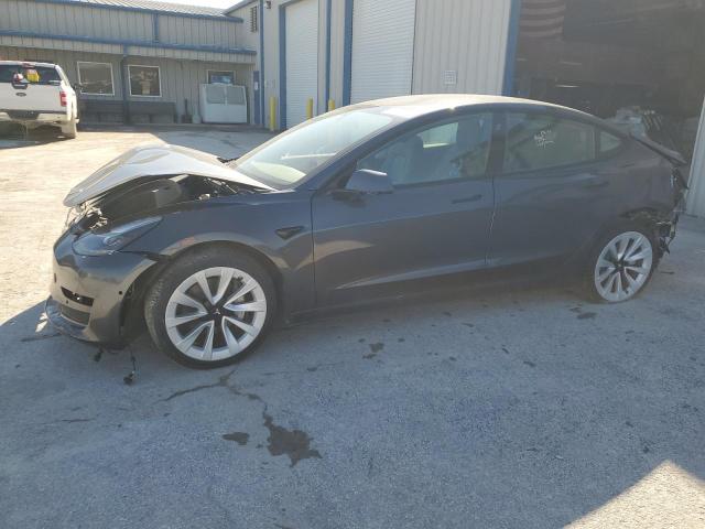 TESLA MODEL 3 2022 with VIN 5YJ3E1EA9NF288227 - Photo from auction