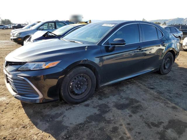 TOYOTA CAMRY LE 2023 with VIN 4T1C31AK7PU051228 - Photo from auction