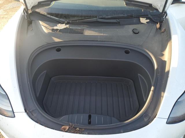 Photo 11 from auction – 2022 TESLA MODEL 3 with VIN 5YJ3E1EAXNF373948