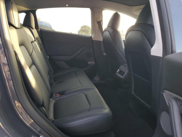 Photo 11 from auction – 2023 TESLA MODEL Y with VIN 7SAYGDEE9PA039532