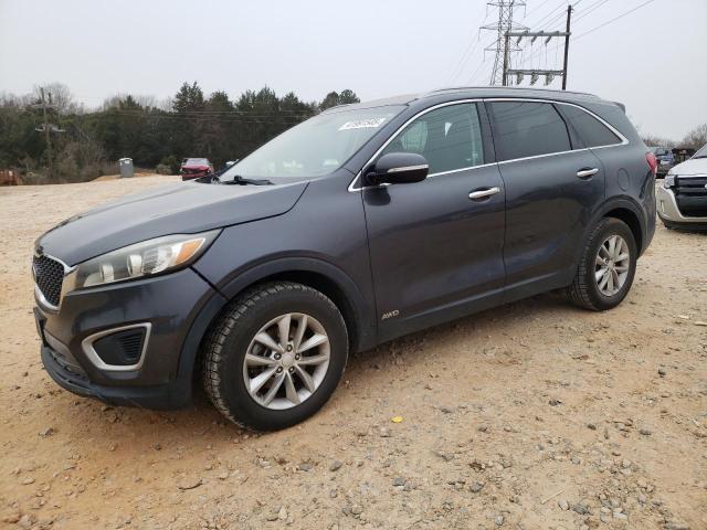 KIA SORENTO LX 2016 with VIN 5XYPGDA37GG166000 - Photo from auction