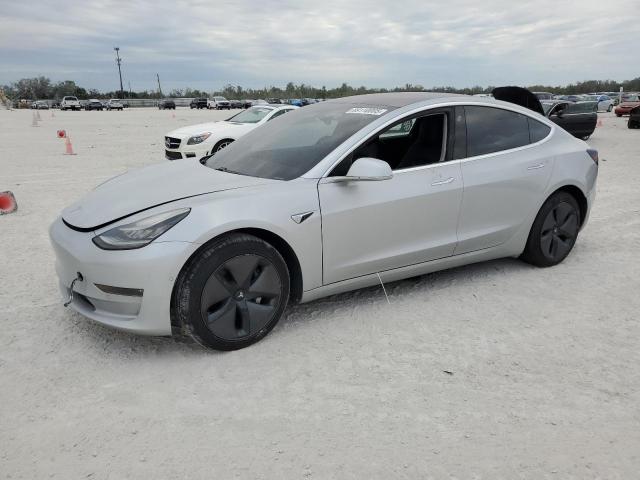 TESLA MODEL 3 2018 with VIN 5YJ3E1EA6JF031598 - Photo from auction
