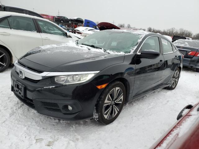 HONDA CIVIC EXL 2017 with VIN 19XFC1F74HE027779 - Photo from auction