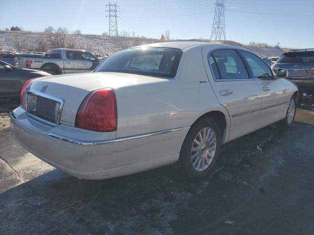 Photo 3 from auction – 2003 LINCOLN TOWN CAR E with VIN 1LNHM81W73Y669991