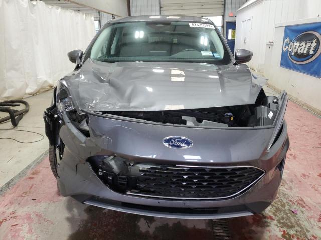 Photo 5 from auction – 2021 FORD ESCAPE SE with VIN 1FMCU9G67MUA02810