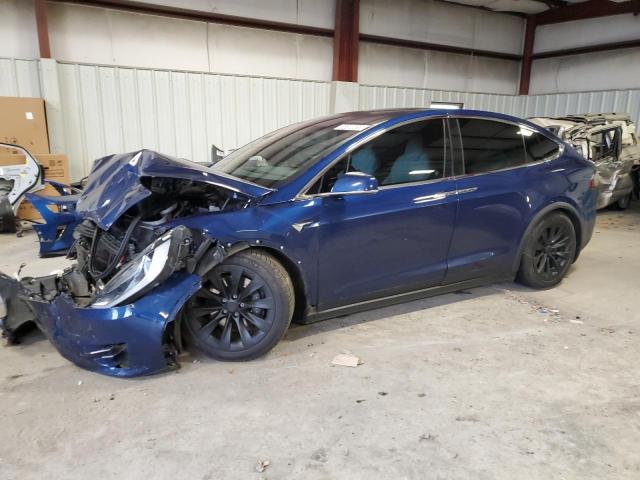 TESLA MODEL X 2017 with VIN 5YJXCAE2XHF044087 - Photo from auction