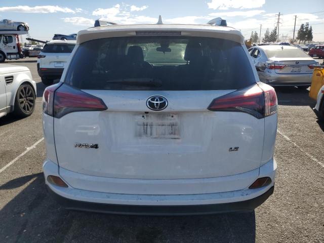 Photo 6 from auction – 2017 TOYOTA RAV4 LE with VIN JTMZFREV8HJ113991