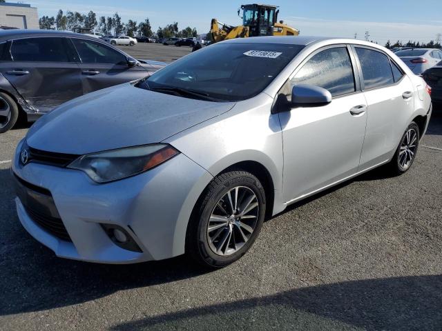 TOYOTA COROLLA L 2016 with VIN 5YFBURHE5GP521989 - Photo from auction
