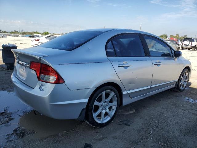 Photo 3 from auction – 2011 HONDA CIVIC LX with VIN 19XFA1F52BE011690