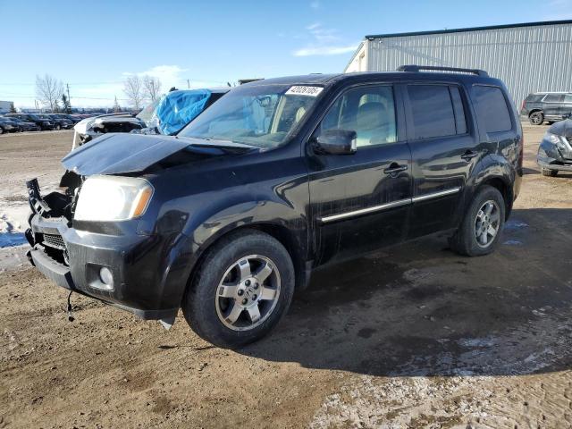 Photo 1 from auction – 2009 HONDA PILOT TOUR with VIN 5FNYF48939B504021