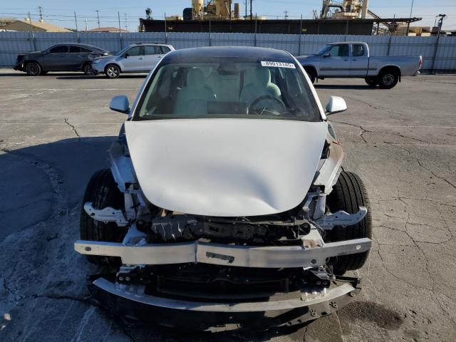 Photo 5 from auction – 2021 TESLA MODEL 3 with VIN 5YJ3E1EB9MF001010