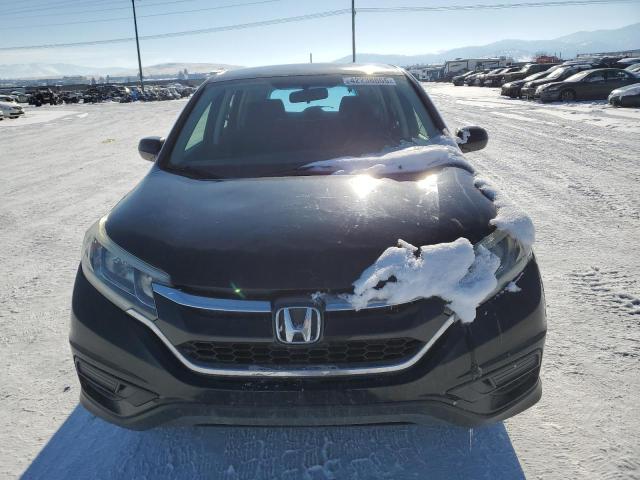 Photo 5 from auction – 2015 HONDA CR-V LX with VIN 5J6RM4H39FL004048