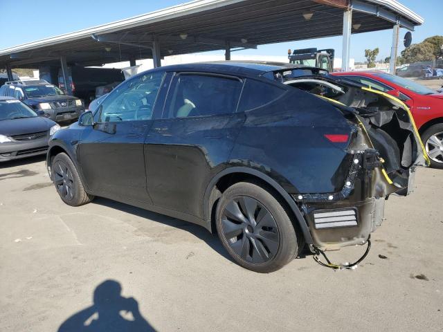 Photo 2 from auction – 2025 TESLA MODEL Y with VIN 7SAYGDEE6SF232541