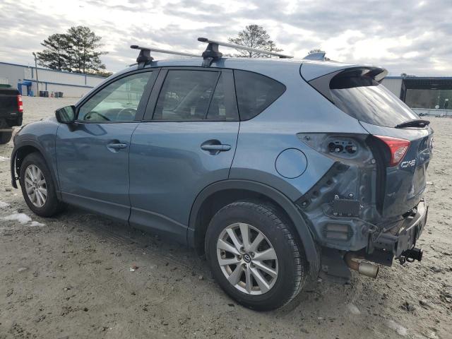 Photo 2 from auction – 2015 MAZDA CX-5 TOURI with VIN JM3KE2CY2F0537895