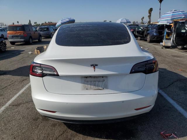 Снимка 6 от търг – 2018 TESLA MODEL 3 с VIN 5YJ3E1EA8JF052386