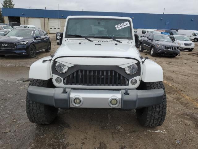 Photo 5 from auction – 2015 JEEP WRANGLER U with VIN 1C4BJWEG4FL685237