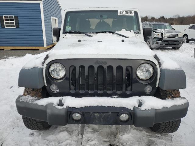 Photo 5 from auction – 2016 JEEP WRANGLER U with VIN 1C4BJWDG0GL245907