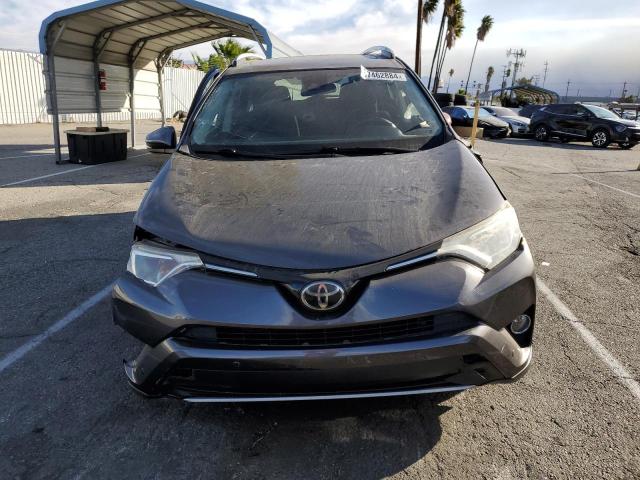 Photo 5 from auction – 2017 TOYOTA RAV4 XLE with VIN JTMWFREV8HJ706608