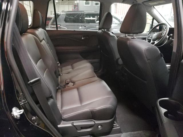 Photo 11 from auction – 2022 HONDA PILOT SE with VIN 5FNYF6H2XNB015804