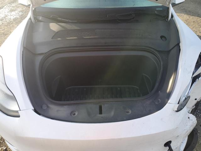 Photo 12 from auction – 2021 TESLA MODEL Y with VIN 5YJYGDEE9MF102186