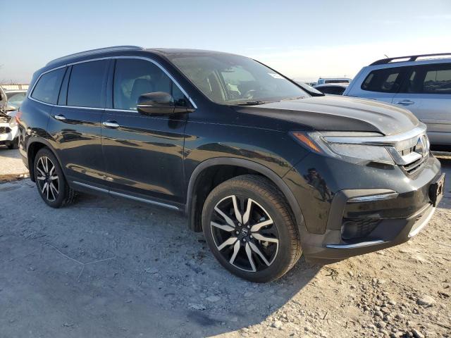 Photo 4 from auction – 2020 HONDA PILOT TOUR with VIN 5FNYF5H64LB006736
