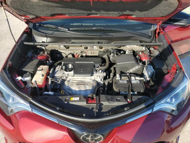 Photo 12 from auction – 2018 TOYOTA RAV4 LE with VIN JTMBFREV3JD241111