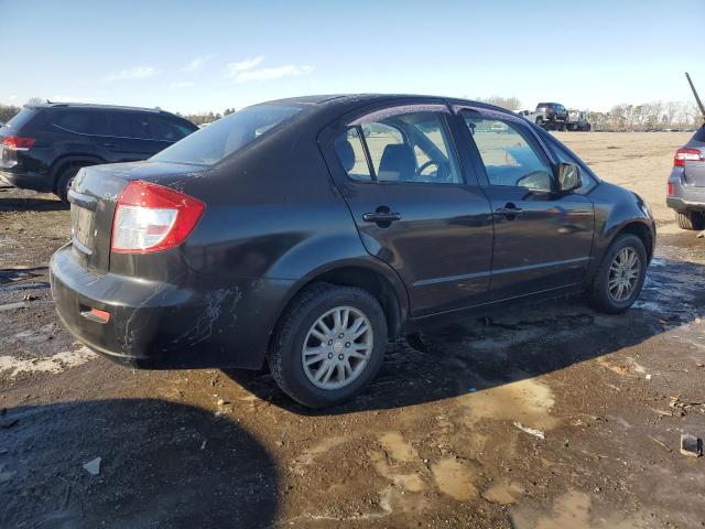 Photo 3 from auction – 2012 SUZUKI SX4 LE with VIN JS2YC5A3XC6303083