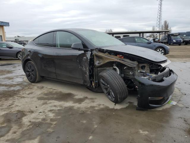 Снимка 4 от търг – 2025 TESLA MODEL Y с VIN 7SAYGAEE3SF257704