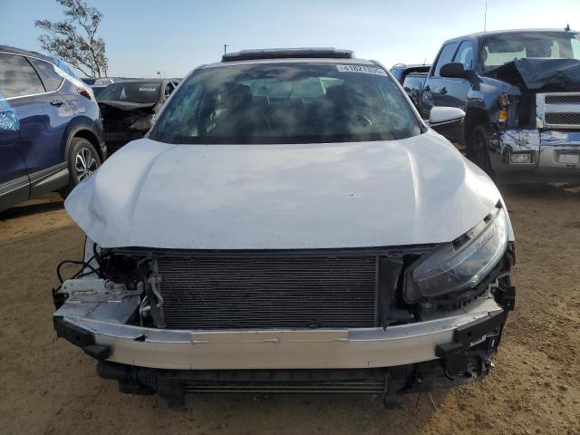 Photo 5 from auction – 2019 HONDA CIVIC TOUR with VIN 2HGFC3B99KH351004