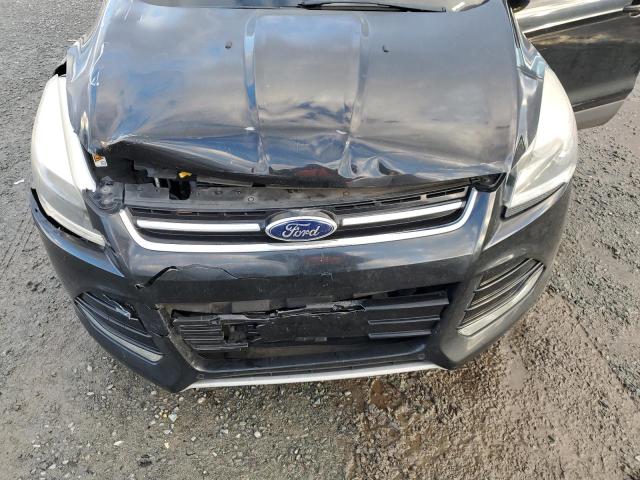 Photo 11 from auction – 2014 FORD ESCAPE TIT with VIN 1FMCU0J98EUA94669