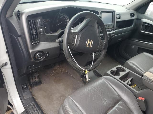 Photo 8 from auction – 2010 HONDA RIDGELINE with VIN 5FPYK1F58AB001901