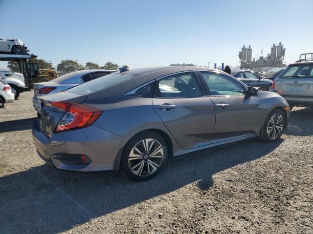 Photo 3 from auction – 2017 HONDA CIVIC EXL with VIN 2HGFC1F78HH634581