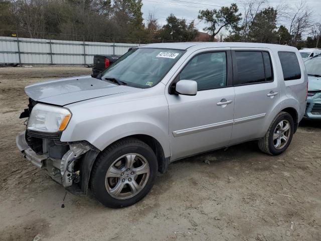 HONDA PILOT EXL 2014 with VIN 5FNYF4H5XEB057372 - Photo from auction