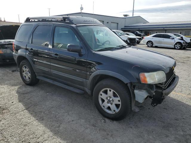 Photo 4 from auction – 2003 FORD ESCAPE XLT with VIN 1FMCU93163KD77303