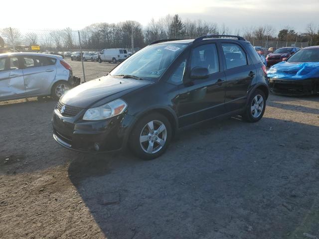 SUZUKI SX4 2011 with VIN JS2YB5A36B6301722 - Photo from auction