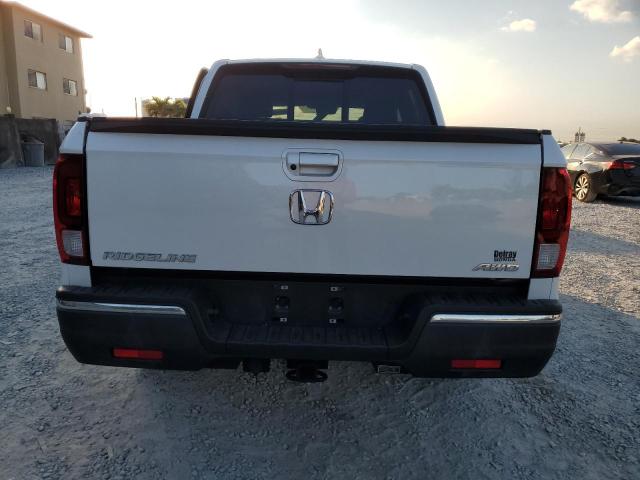 Photo 6 from auction – 2020 HONDA RIDGELINE with VIN 5FPYK3F55LB024342