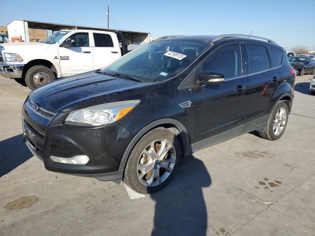 FORD ESCAPE TIT 2014 with VIN 1FMCU0JXXEUB97929 - Photo from auction